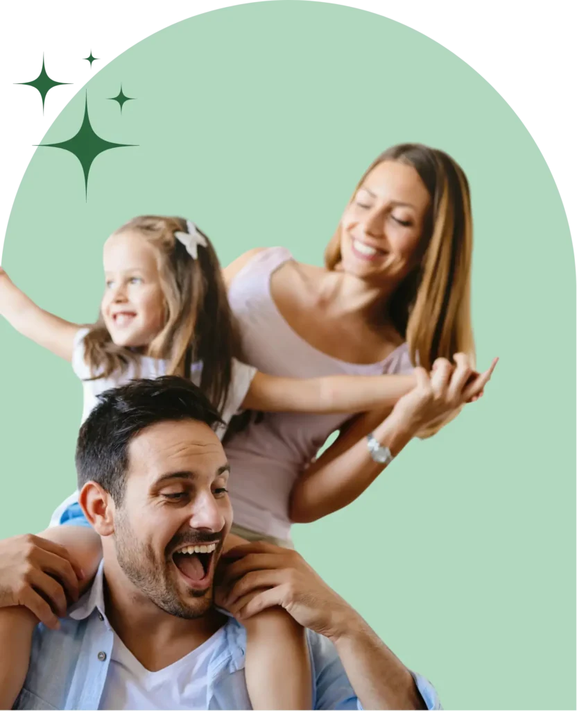 Happy family playing together, smiling.